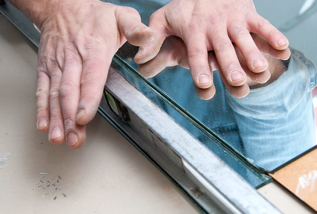 Cutting Mirror w A Glass Cutter