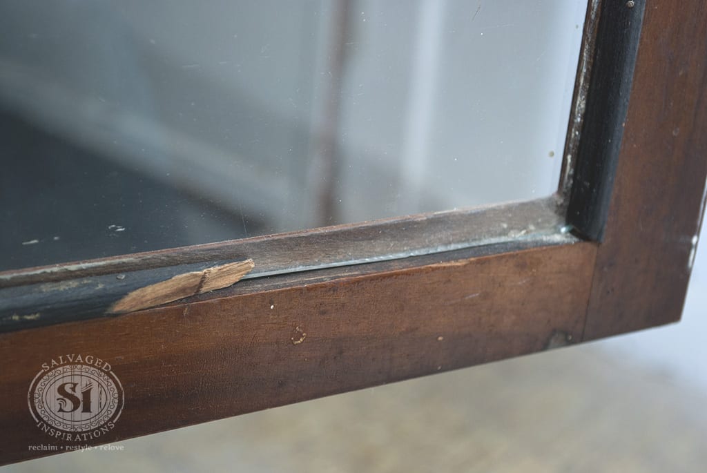 Broken Glass Frame on Antique China Cabinet