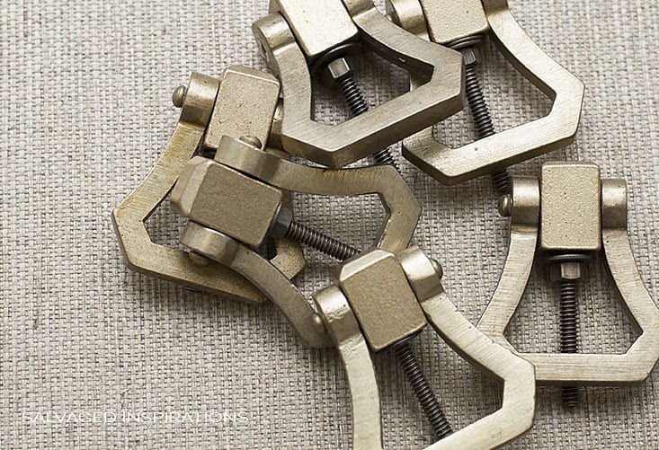 GrassCloth Wallpaper and Brushed Brass Pulls