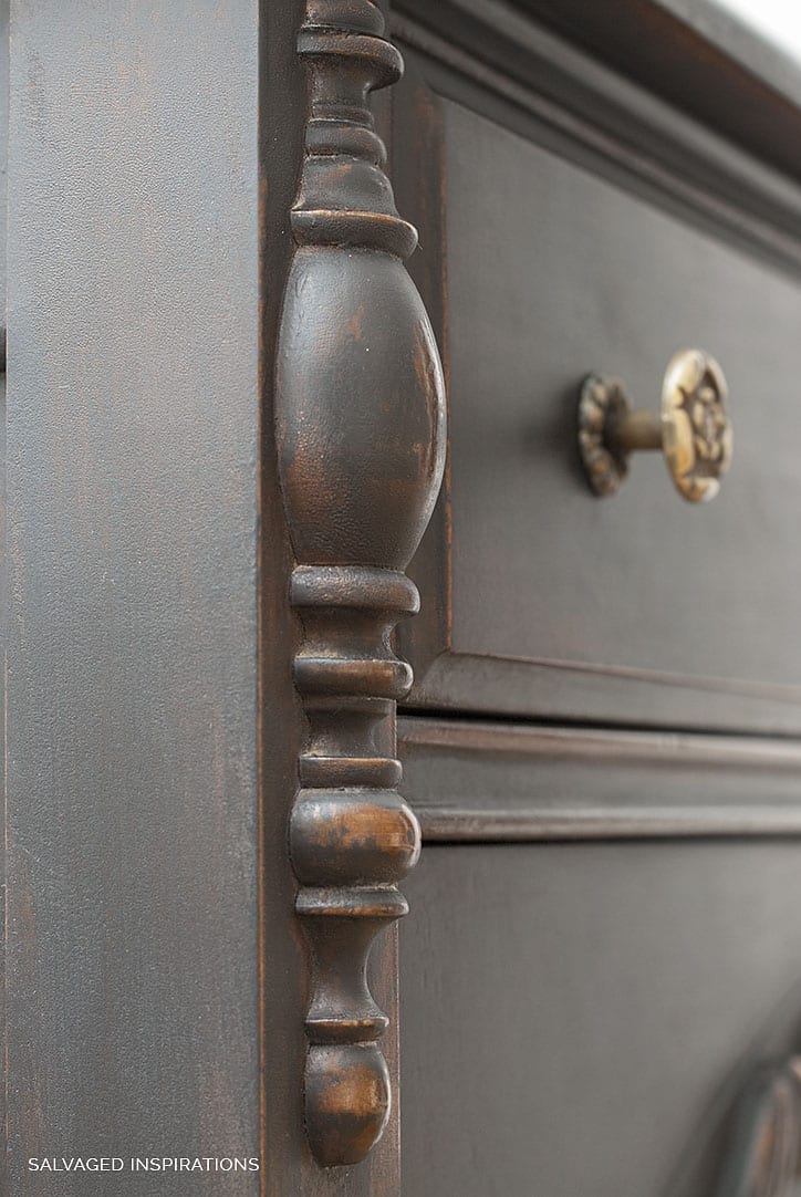 Close Up of Distressed Caviar Black Paint on Vintage Dresser