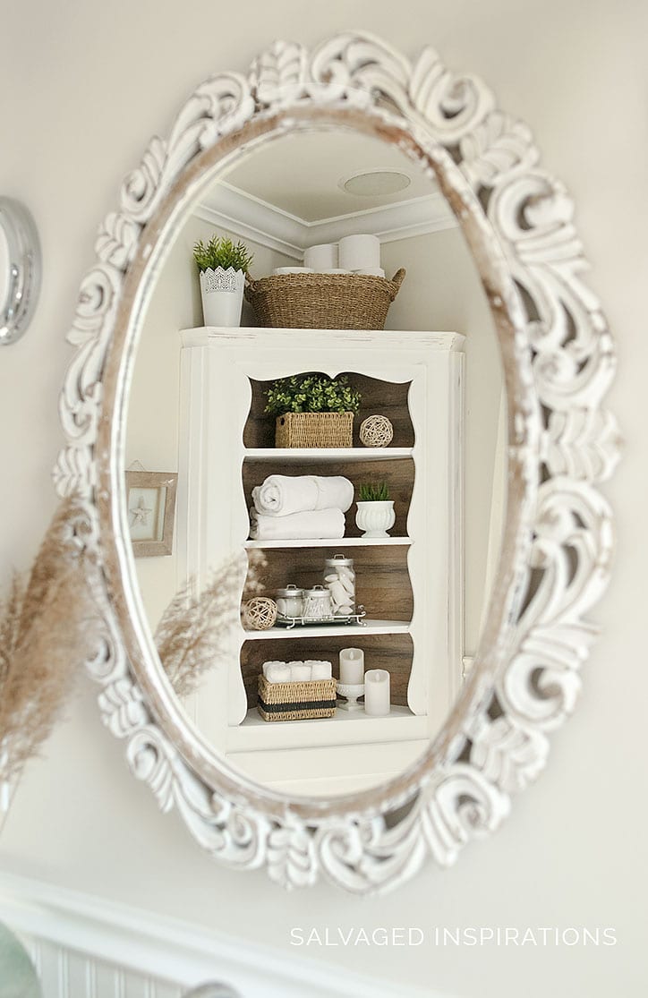 Reflection of Corner Cabinet with Barnwood Backing
