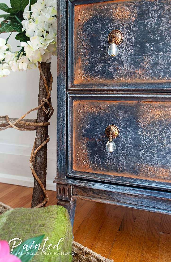 Close Up of Raised Stencil and Gilded Drawers