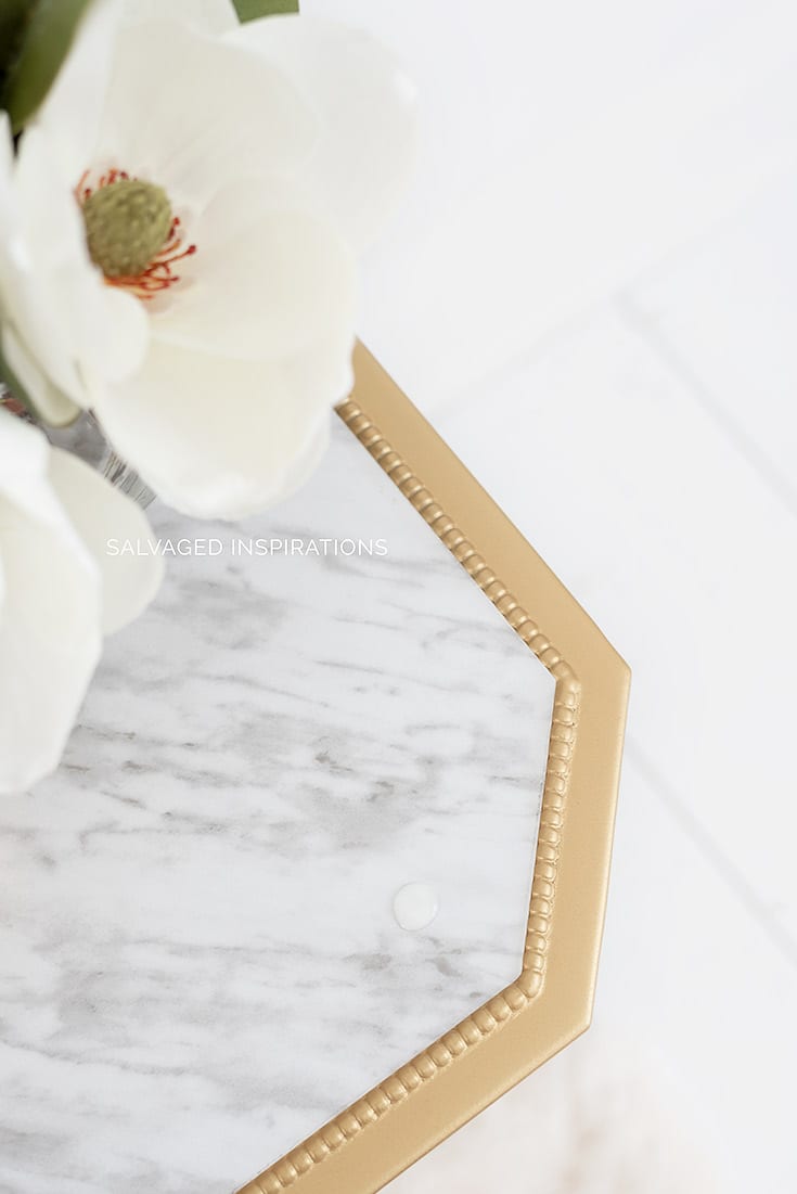 Close Up of DIY Marble Table w Water Drop