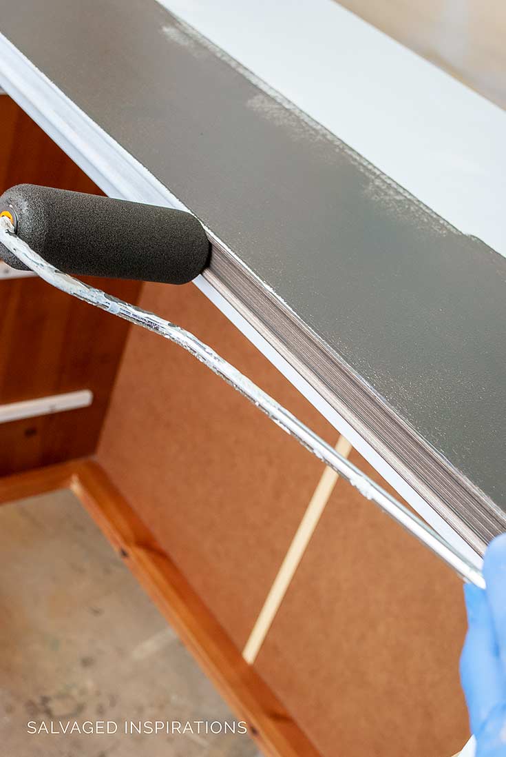 Painting Furniture w High Density Roller