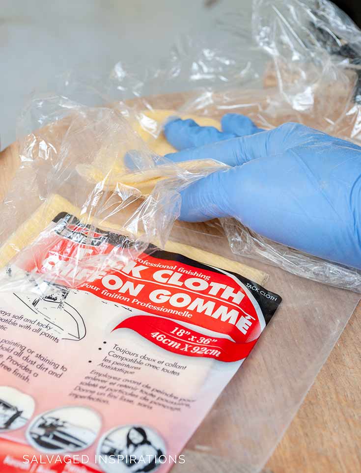Wiping Off Dust with Tack Cloth