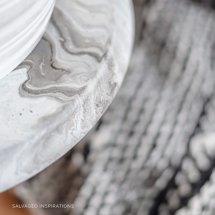 Close Up of Marble Pour Painted Plant Stand