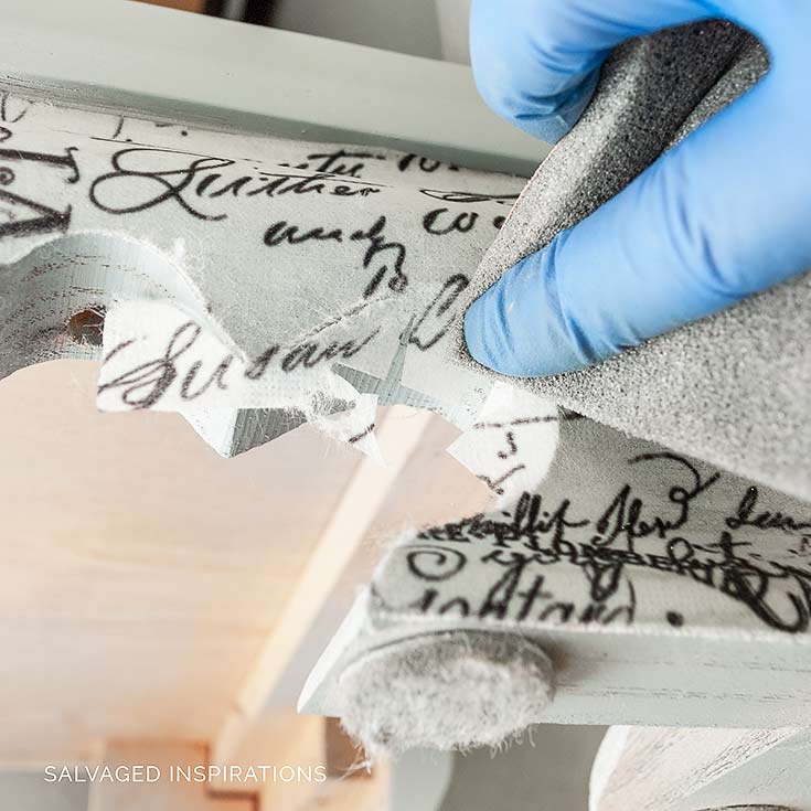 Trimming off Decoupage Paper w Sandpaper