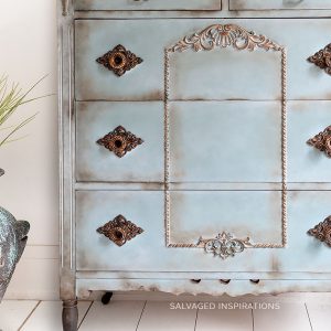 Close Up of Copper Gilded Trim Design on Dresser