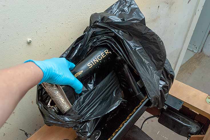 Wrapping Vintage Singer Before Painting